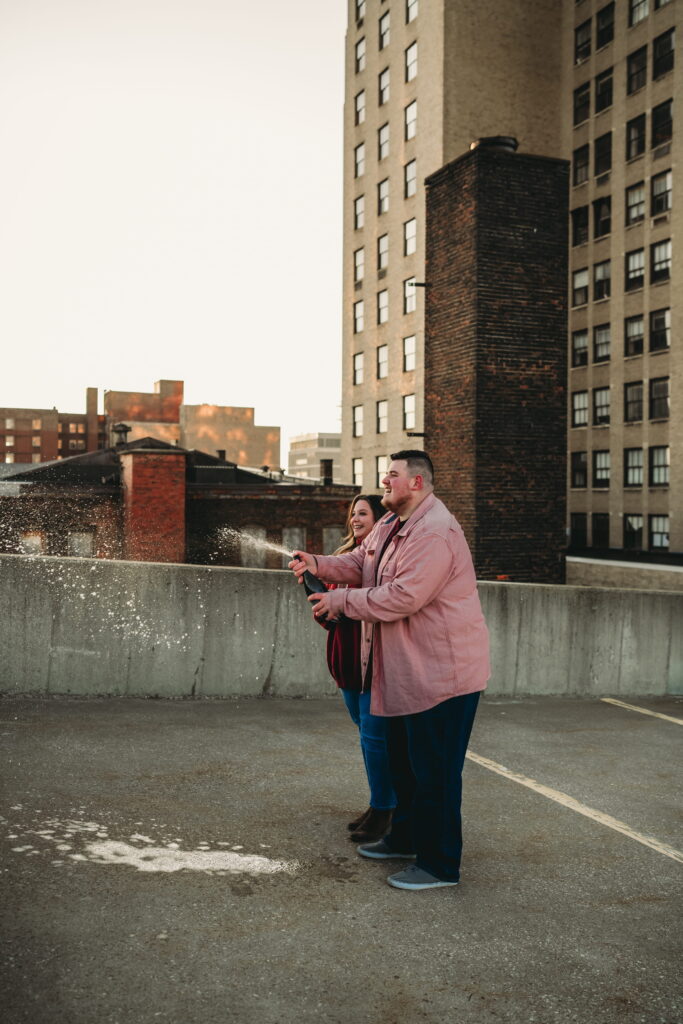 Capturing Love and Emotion: Moody and Romantic Engagement Portraits in Downtown Erie and Pittsburgh, PA by Rylee Louisa Photography. Specializing in Candid Moments on Rooftop Parking Garages, this Wedding and Couples Photographer beautifully portrays the Emotional Essence of Love in Urban Landscapes.