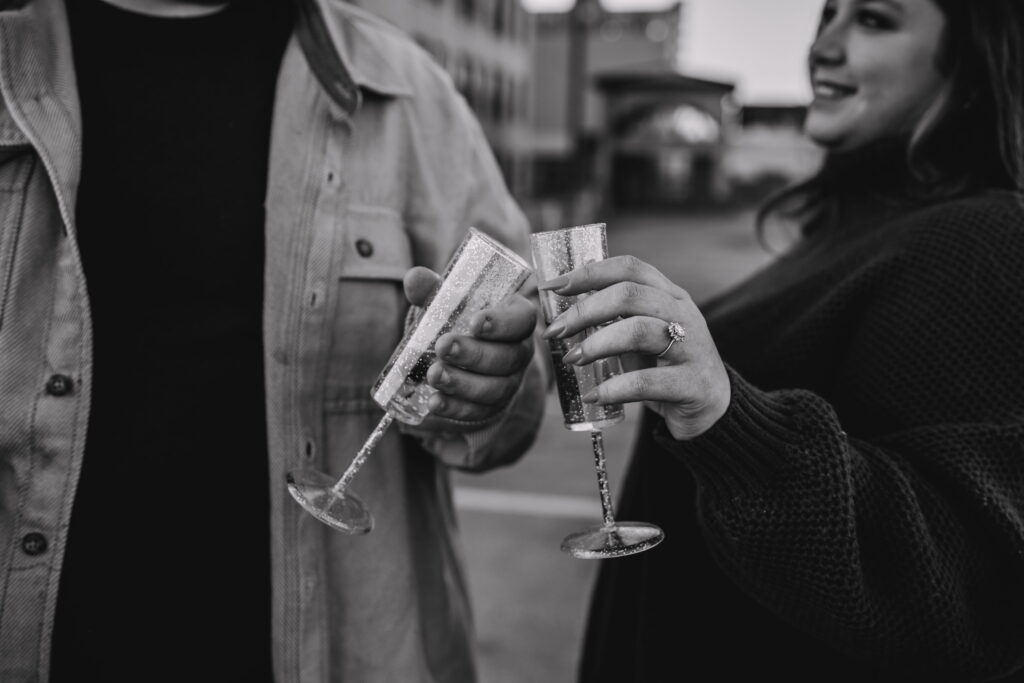 Capturing Love and Emotion: Moody and Romantic Engagement Portraits in Downtown Erie and Pittsburgh, PA by Rylee Louisa Photography. Specializing in Candid Moments on Rooftop Parking Garages, this Wedding and Couples Photographer beautifully portrays the Emotional Essence of Love in Urban Landscapes.