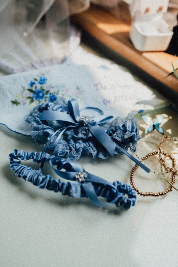 Dreamy vintage-style portrait of a queer couple on their wedding day